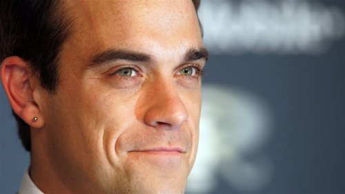 TIL NORGE: Robbie Williams spiller i Trondheim 1. august.